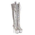 A pair of silver sequined thigh-high boots with platform soles and high stiletto heels, featuring white lace-up detailing on the front.