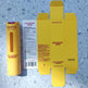 Yellow PHOFAY salicylic acid treatment essence packaging on a blue speckled surface