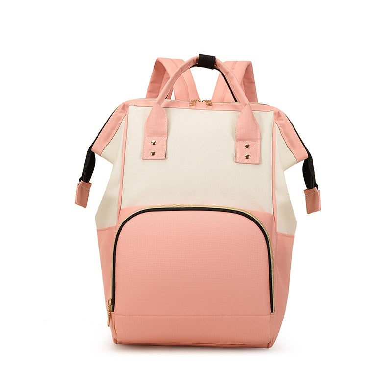 Pink and beige backpack on a white background