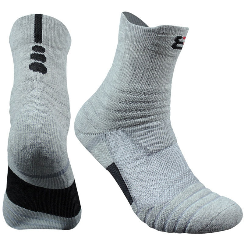Gray socks with black accents on a white background