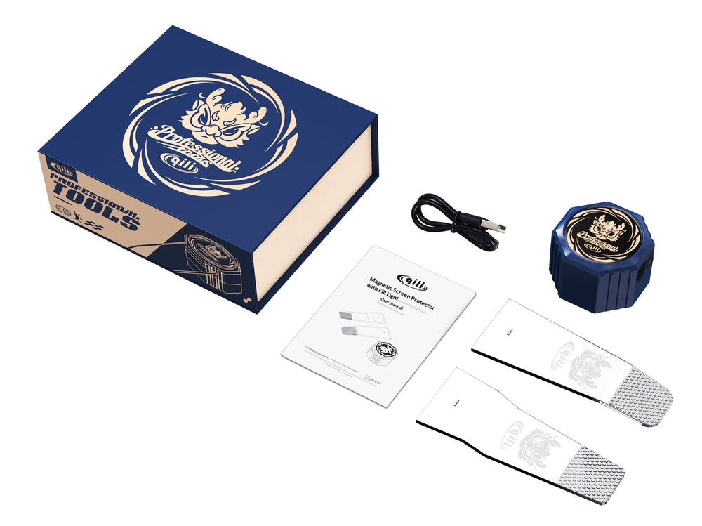 A set of professional tools and accessories displayed on a clean white background, including a blue and beige presentation box, a blue handheld device with a gold emblem, a black USB cable, a white instruction booklet, and two white strap-like pieces with gray textured ends.