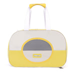 Pet carrier with yellow and gray design on a white background
