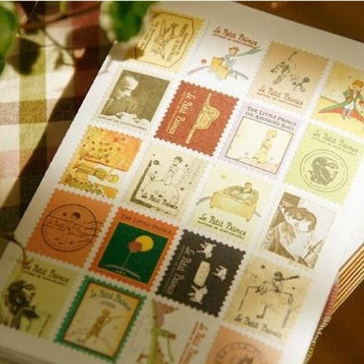 Collection of vintage-style postage stamps on a book page