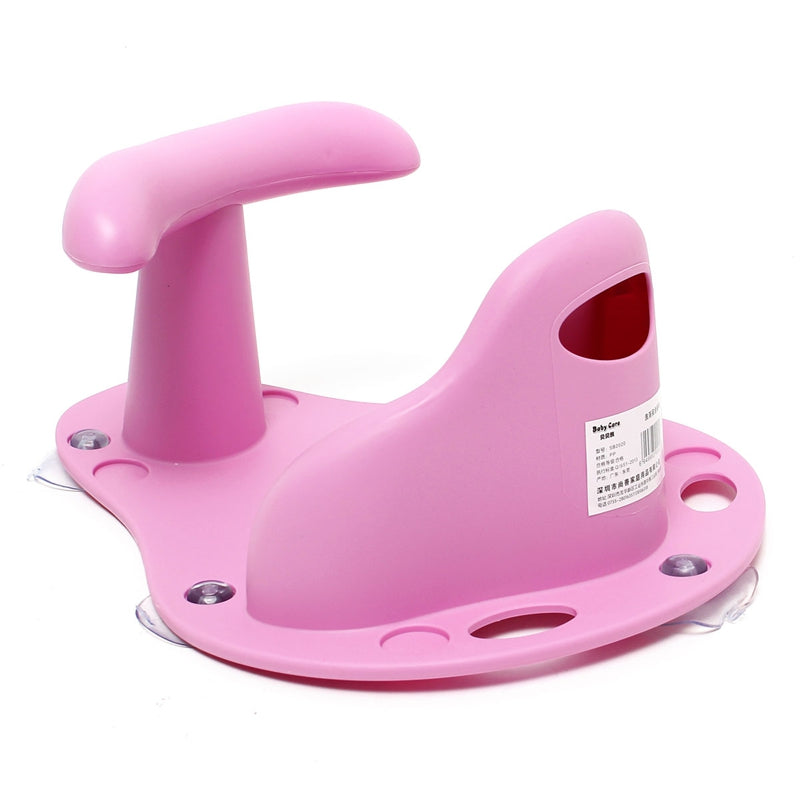 Pink plastic device with a handle on a white background