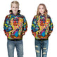 Two people wearing colorful hoodies with a lion design on a white background