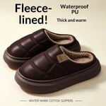 A pair of dark brown fleece-lined slipper shoes with thick soles, shown on a light beige background with promotional text highlighting waterproof PU and warm fleece lining.