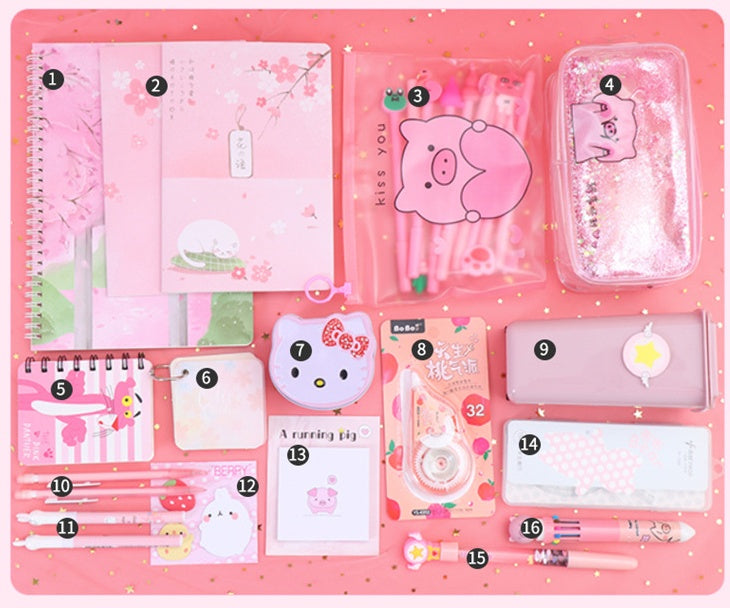 A pink stationery set arranged on a pink background, including notebooks, pens, a glittery pencil case, a small Hello Kitty-themed item, a notepad, and other cute pastel accessories.