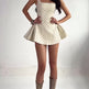Polka dot mini party dress in white