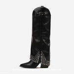 A single black leather knee-high boot with pointed toes, low block heels, and silver rhinestone embellishments along the lower shaft and around the buckle detail near the top, shown against a plain white background.