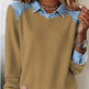 Brown sweater with denim collar and cuffs worn by a person.