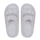 Pair of white slides with buckles on a white background