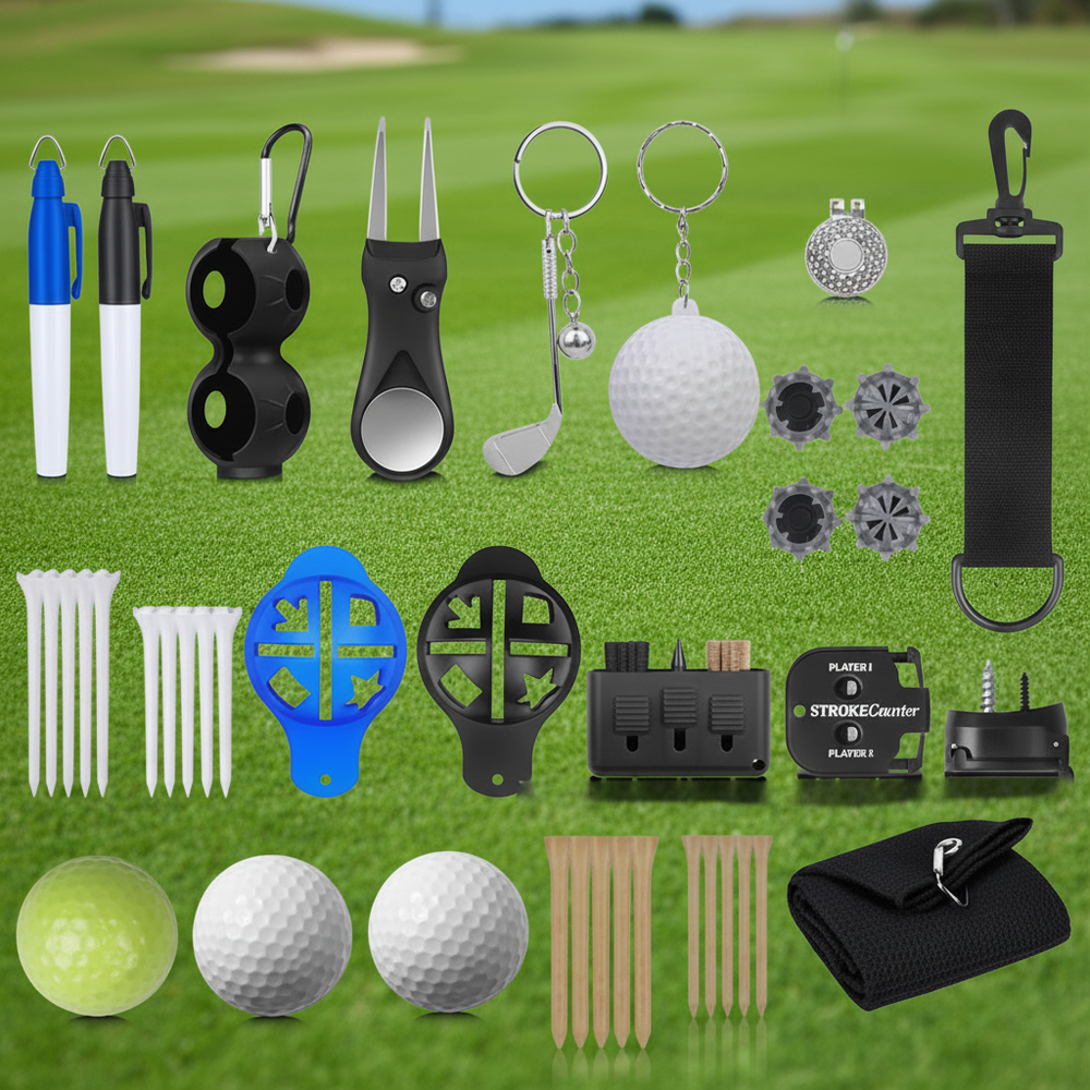 A multi-piece golf accessory kit arranged on a light gray background, including ball markers, dividers, keychain tools, a golf ball, tees, alignment sticks, a strap, and a black pouch.
