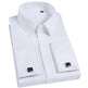 Folded white dress shirt with cufflinks on a white background