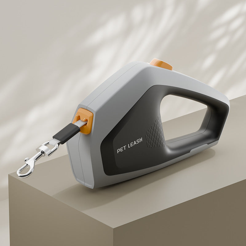 Pet leash with reel on a beige surface