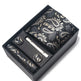Set of cufflinks and tie clip in a decorative box with paisley pattern