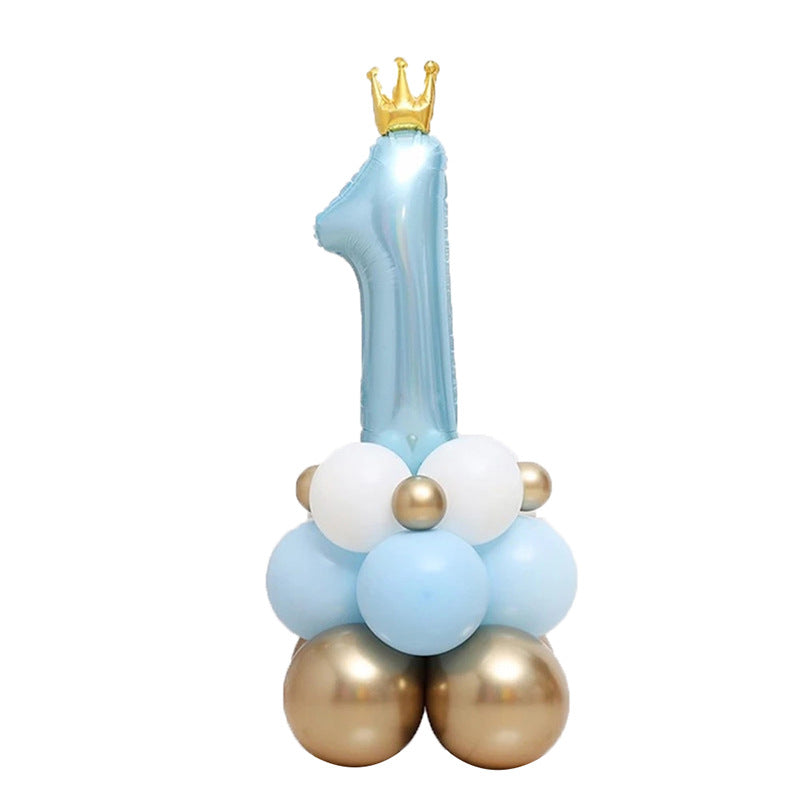 Balloon arrangement with number '1' and crown on a white background