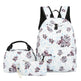 Floral-patterned backpack, lunch bag, and pouch on a white background