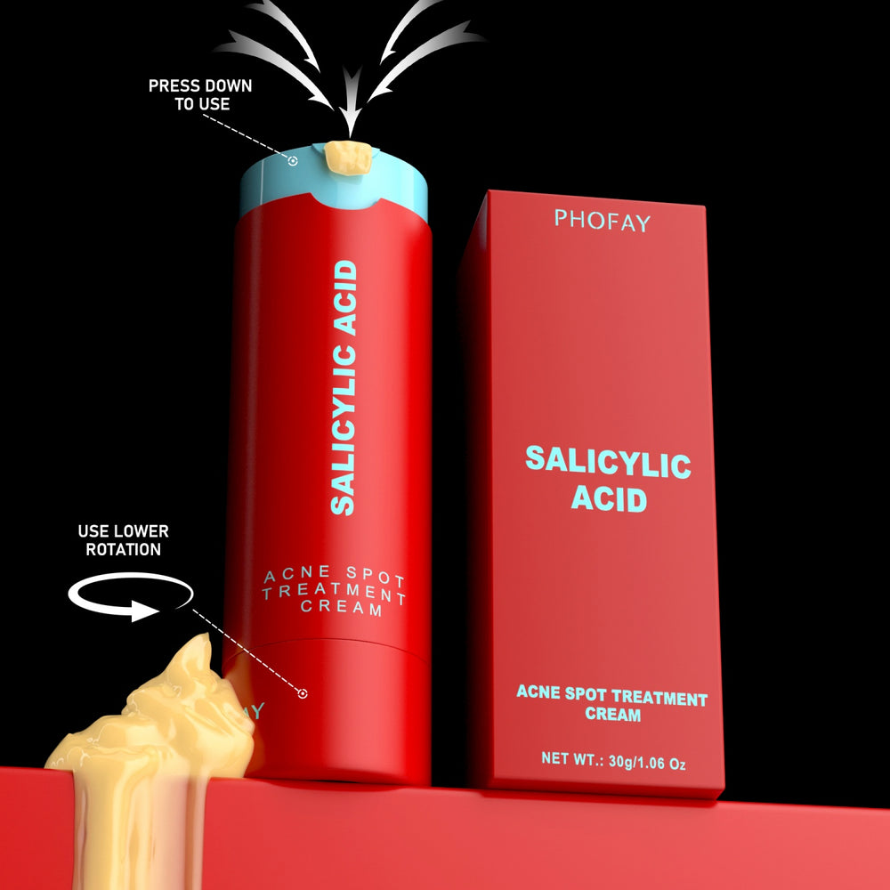 Red Salicylic Acid acne spot treatment cream with packaging on a black background