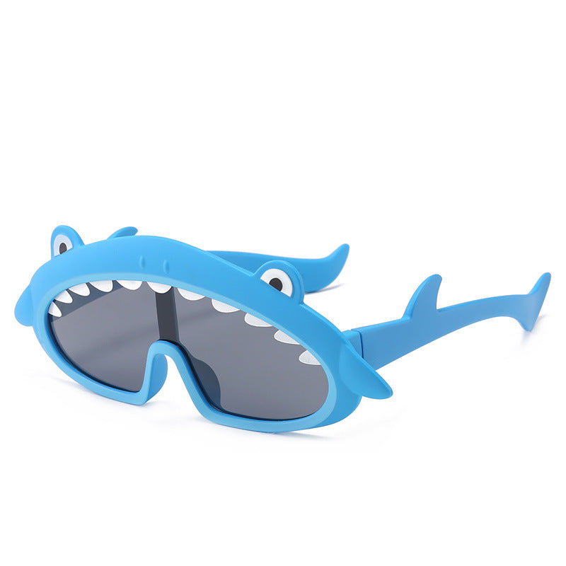 Blue shark-shaped sunglasses on a white background