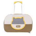 Pet carrier with cat face design and yellow accents on a white background