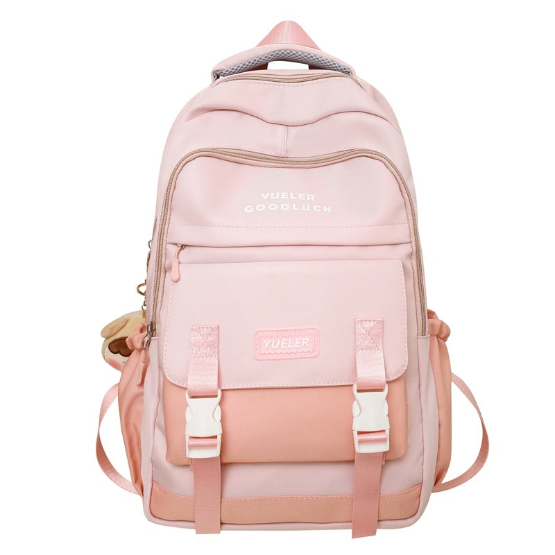 Pink backpack with visible branding on a white background