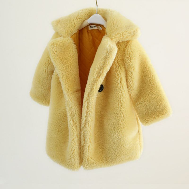 Yellow fluffy coat on a white background