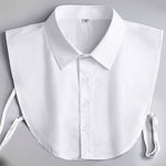 White shirt collar on a gray background