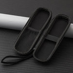 Black mesh shoe bag on a textured gray surface