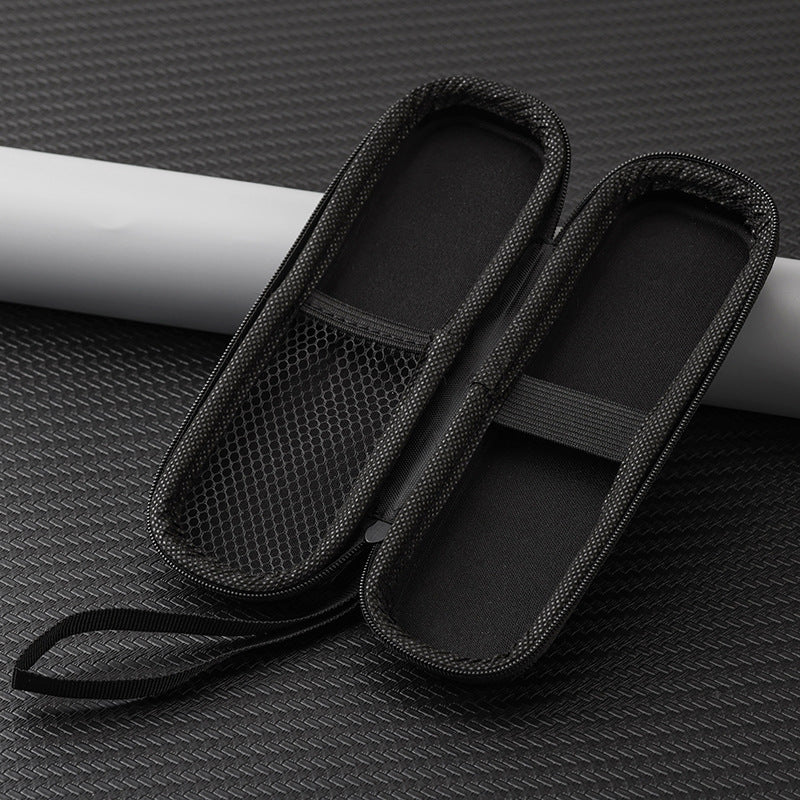 Black mesh shoe bag on a textured gray surface