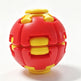 A red and yellow interlocking ball-shaped toy or puzzle, photographed on a clean white background.