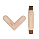 Makeup stick with two ends showing different shades on a white background