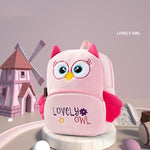 Pink owl-shaped backpack with 'Lovely Owl' text on a white background