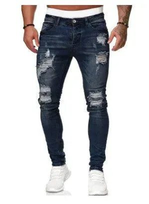 Jeans di pantaloni di jeans bianchi strappati