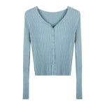 Light blue ribbed knit cardigan on a white background