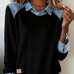 Black sweatshirt with denim collar and cuffs worn by a person.
