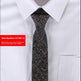 White shirt with a black patterned tie on a white background, item number H7706-12 displayed.