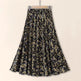 Floral patterned skirt on a beige background