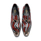Pair of red, black, and white patterned loafers with gold accents on a white background.
