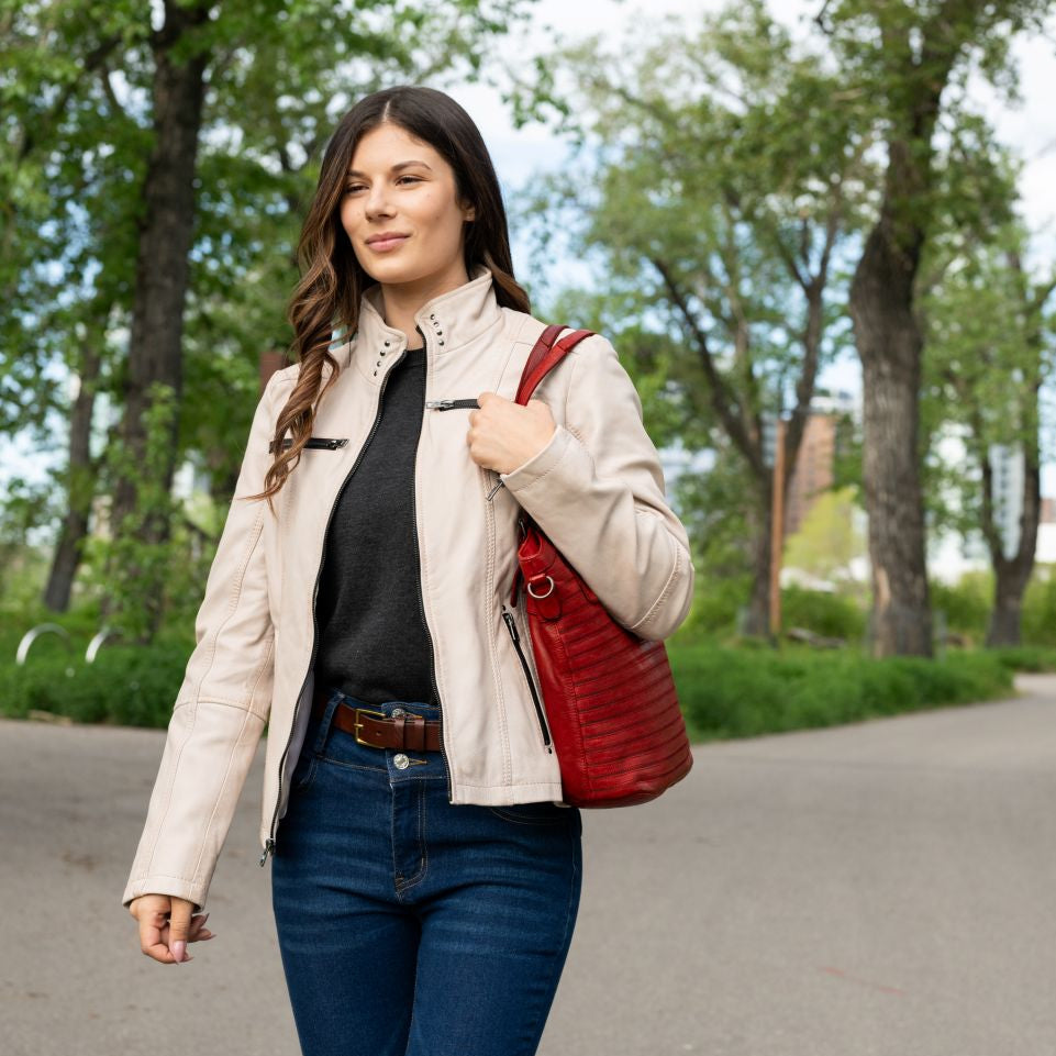 Women's Classic Lamb Leather Jacket. Round Collar with Studs, 4 Zippered Pockets & Shoulder Accent Stitching 