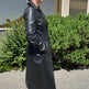 Trench-coat classique en cuir pour femmes. Fermeture à boutons croisés avec ceinture réglable 