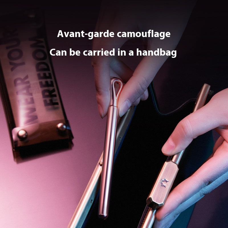 Metallic pen with camouflage pattern held by a hand, text 'Avant-garde camouflage Can be carried in a handbag' above.