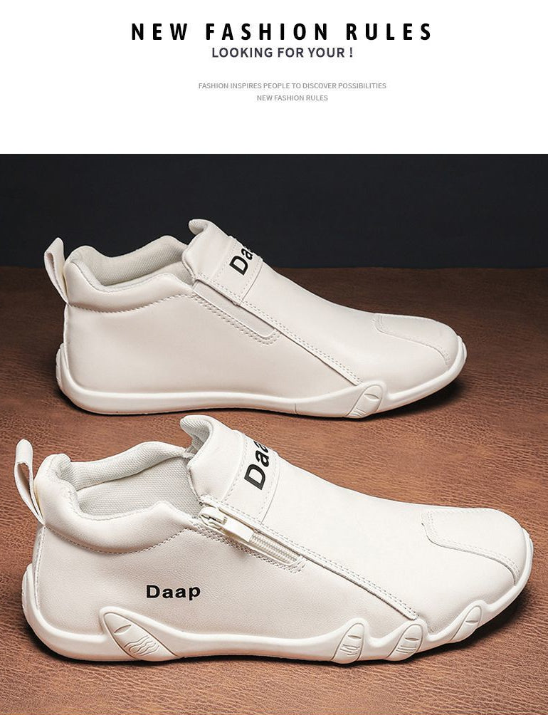 White sneakers with 'Daap' branding on a wooden surface