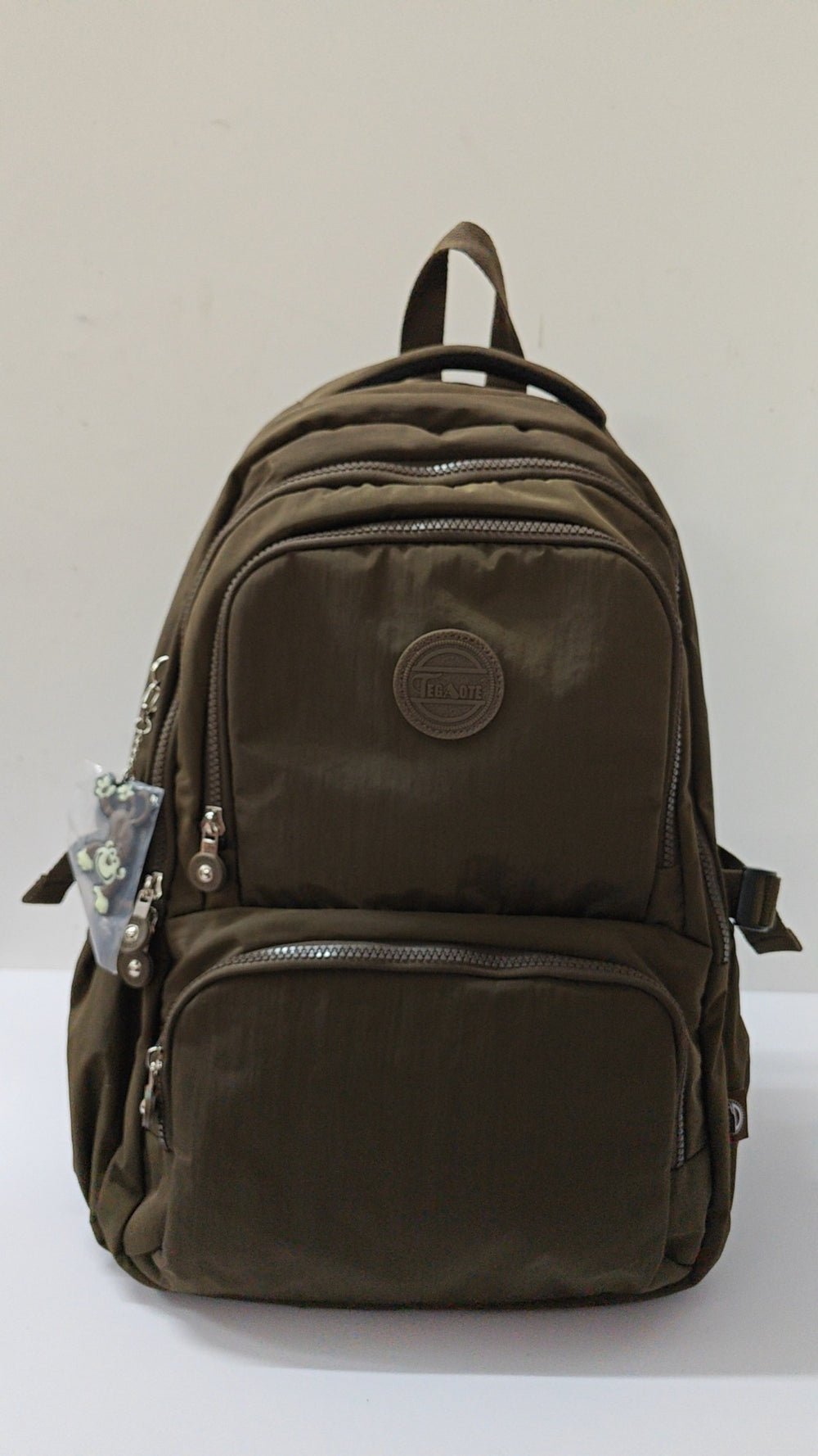 Brown backpack on a white background