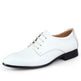 White dress shoe with black sole on a white background