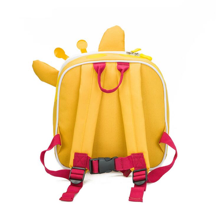 Yellow backpack with pink straps on a white background