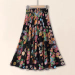 Floral patterned skirt on a beige background