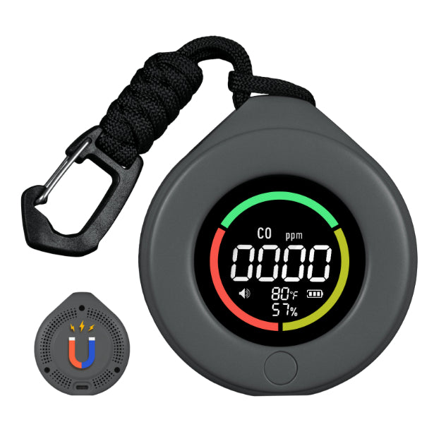 Black digital CO2 meter with carabiner on a white background