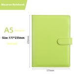 Light green notebook with dimensions labeled on a white background