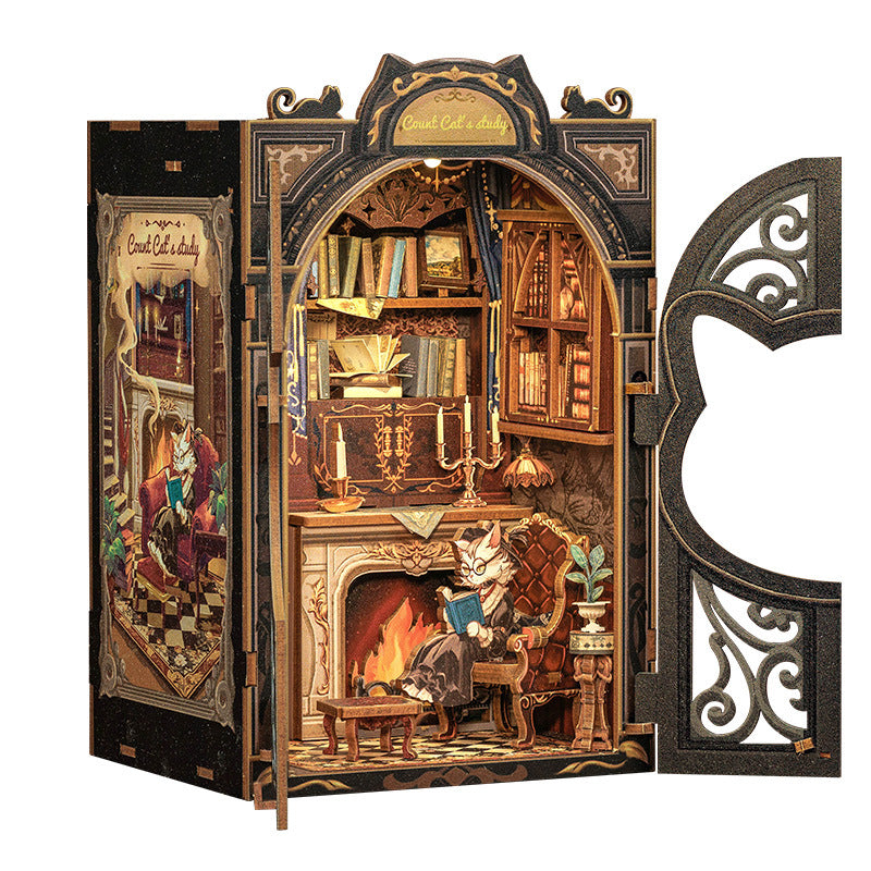 Detailed model of a room with a cat reading a book by a fireplace, featuring intricate design and open door.