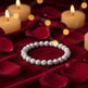 White marbled beaded bracelet on a white background